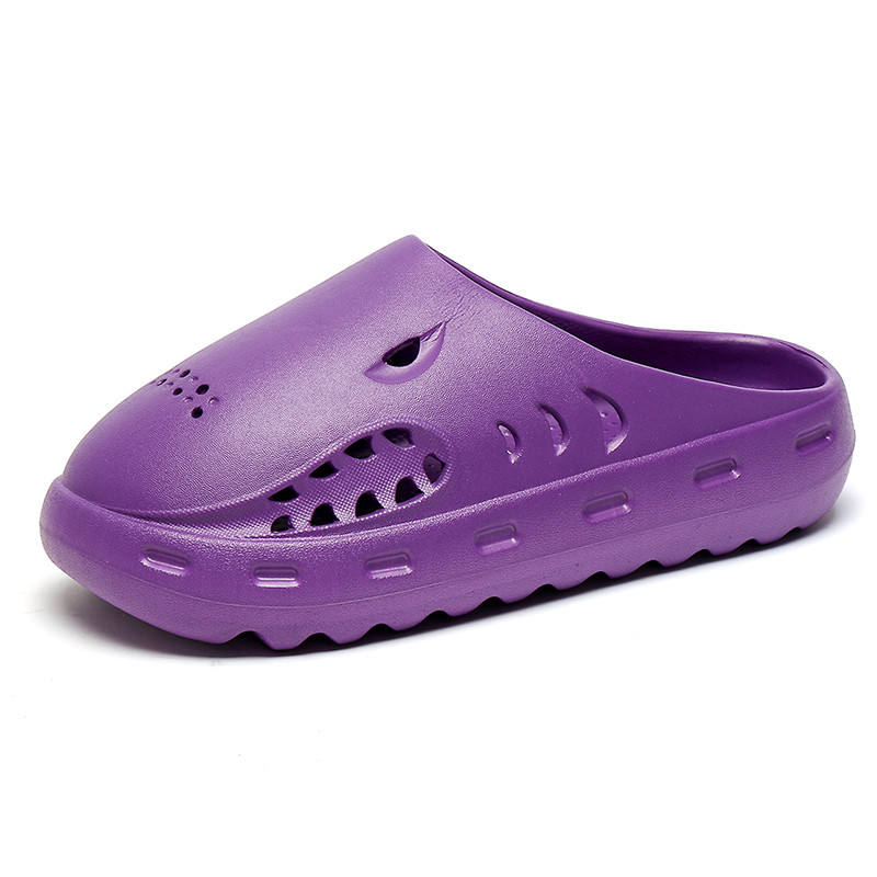 Purple clog shoe on a white background