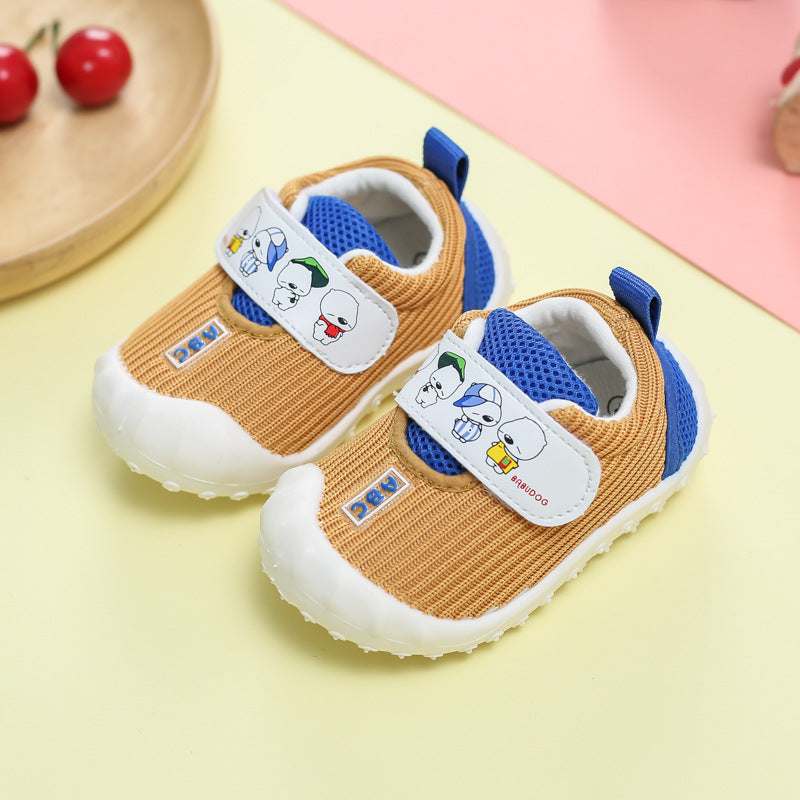 Pair of children's shoes with cartoon character design on a colorful background