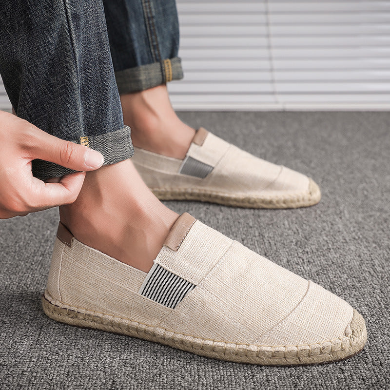 Person wearing beige espadrille shoes with a casual setting.