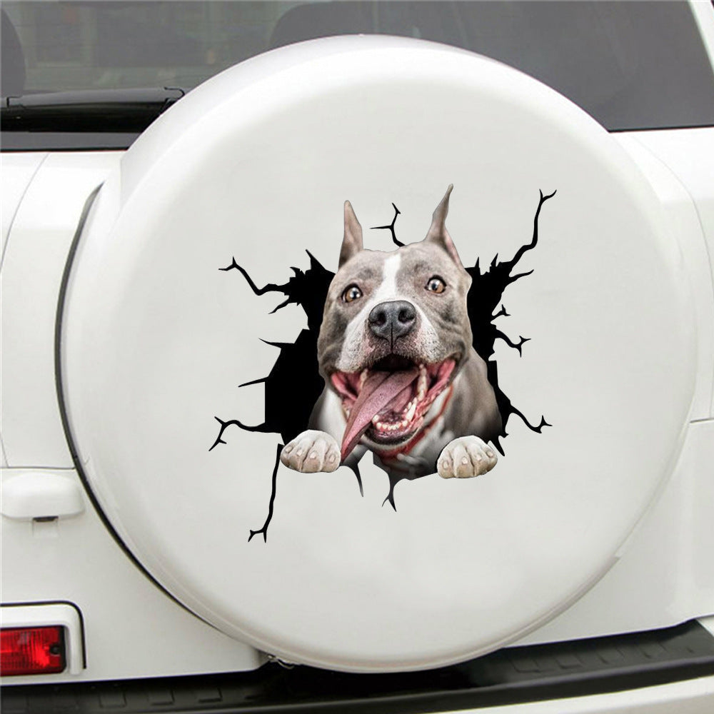 Car spare tire cover with a dog design peering through a cracked surface.