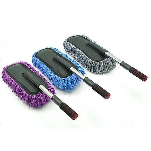 Three car cleaning brushes with different colored bristle pads on a white background