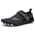 Black and gray water shoe with a strap on a white background