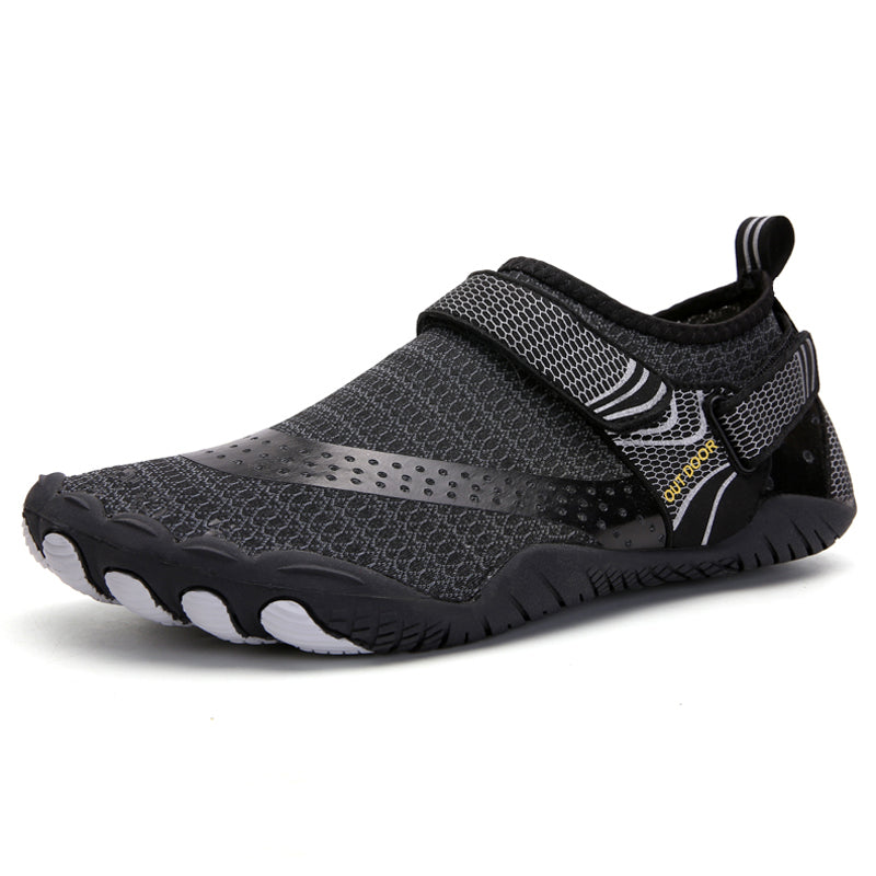 Black and gray water shoe with a strap on a white background