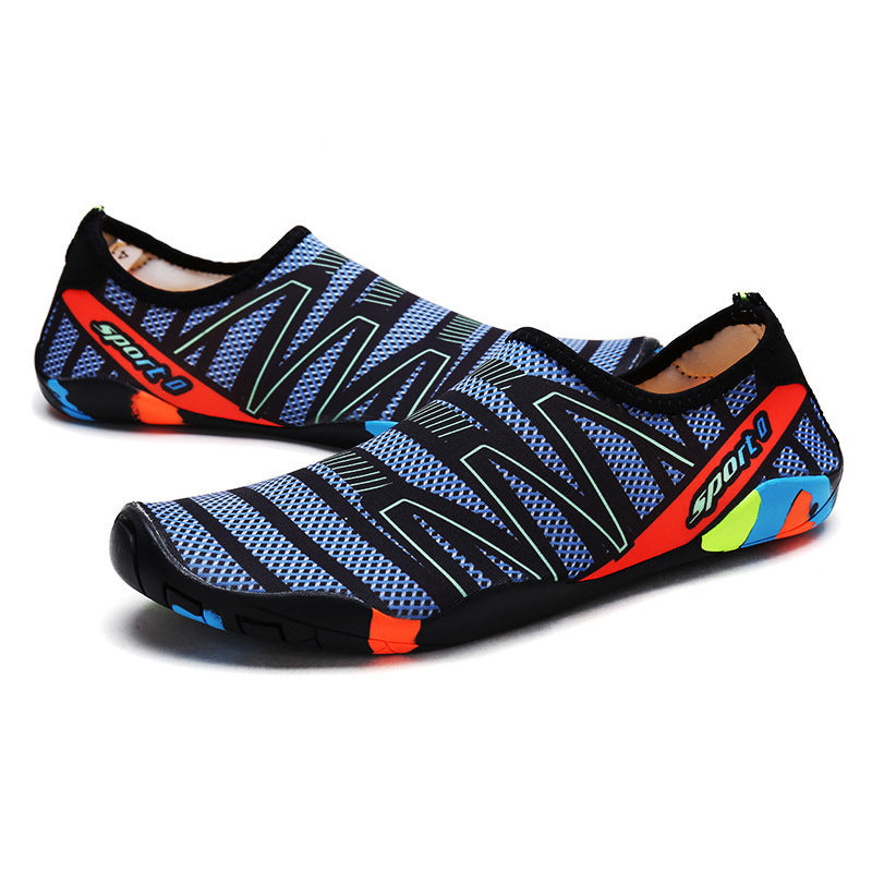 Pair of blue and black water shoes with colorful accents on a white background