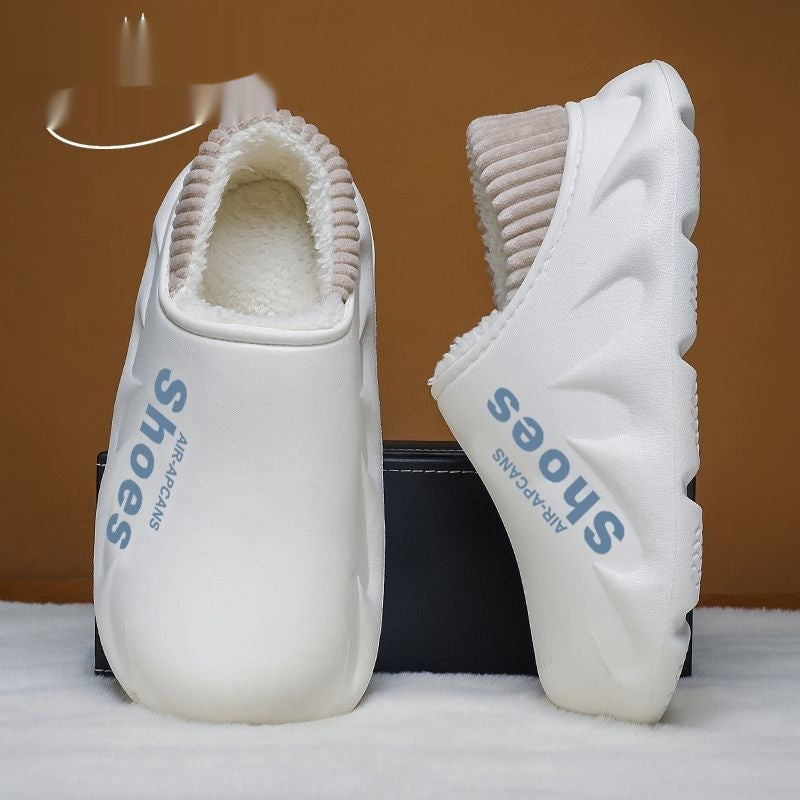 White slip-on shoes with 'shoes' text on a brown background