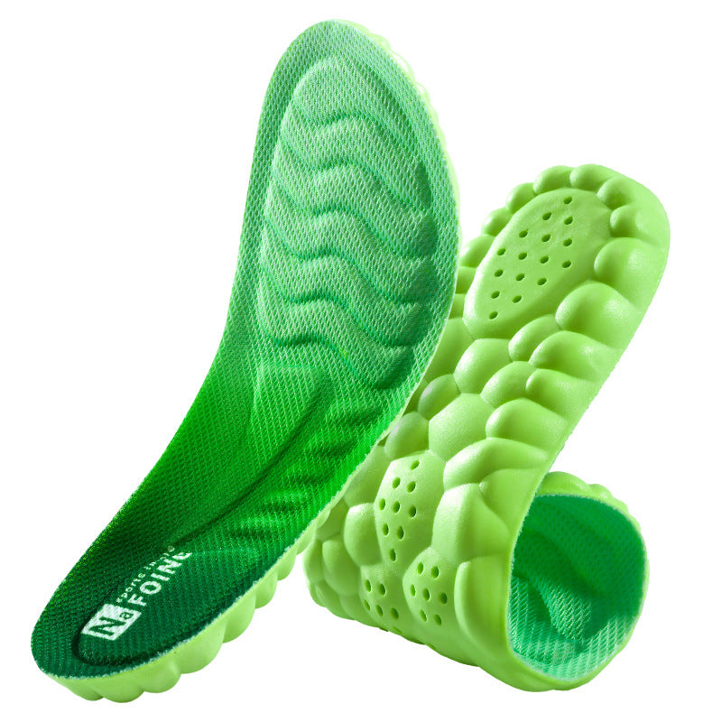 Green massage roller and insole on a white background