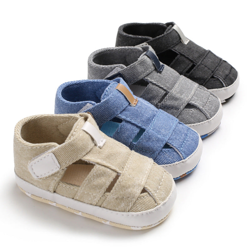 Set of children's sandals in various colors on a white background