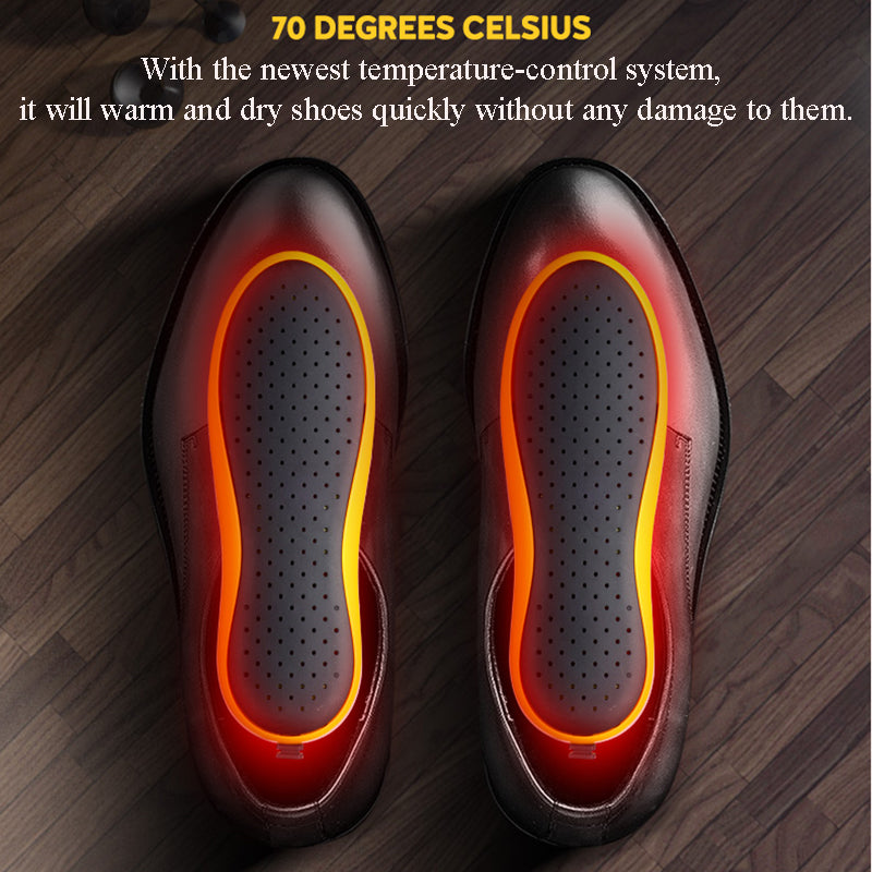 Heated shoe inserts with glowing red heating elements on a wooden floor.