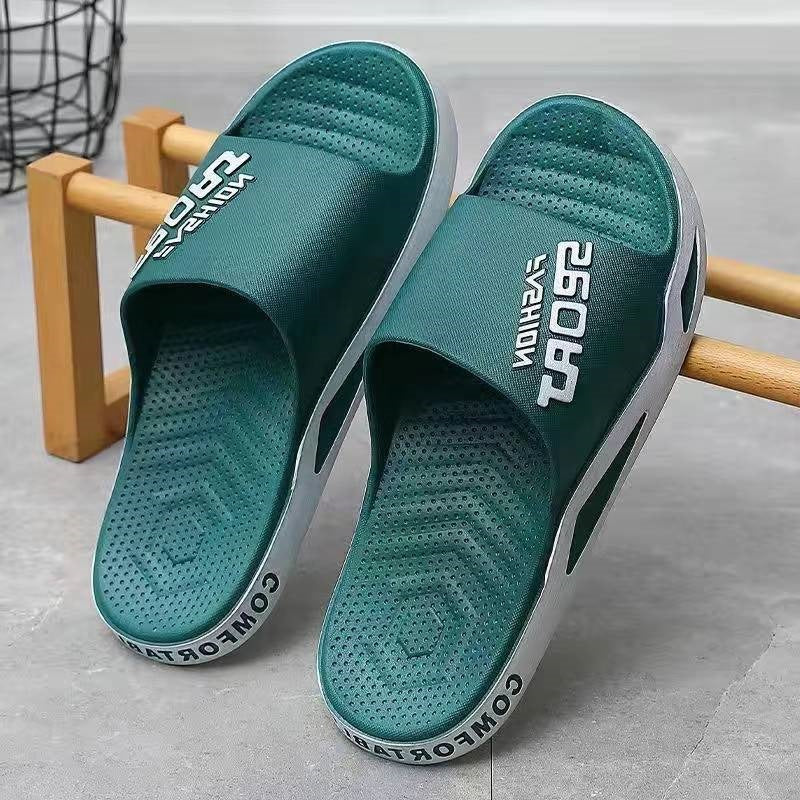 Teal slides with brand logo on a gray surface