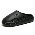 Black clog shoe on a white background