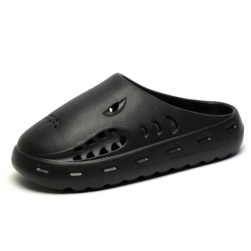 Black clog shoe on a white background