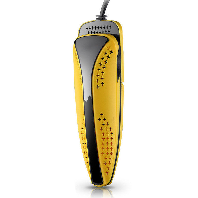 Yellow and black shoe dryer on a white background