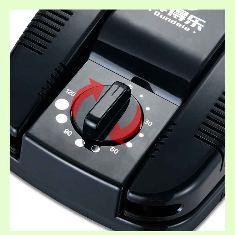 Black and red control knob on a device with visible brand name.