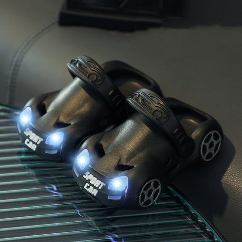 Toy cars with LED lights on a reflective surface