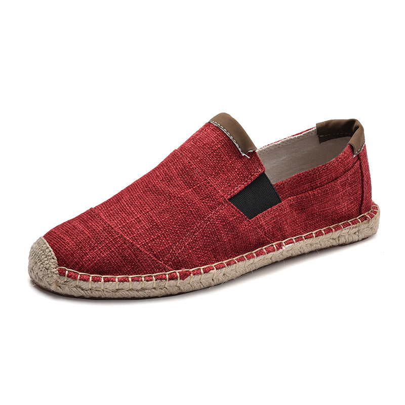 Red espadrille shoe on a white background