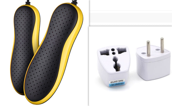Black and yellow shoe inserts with two white plugs on a white background