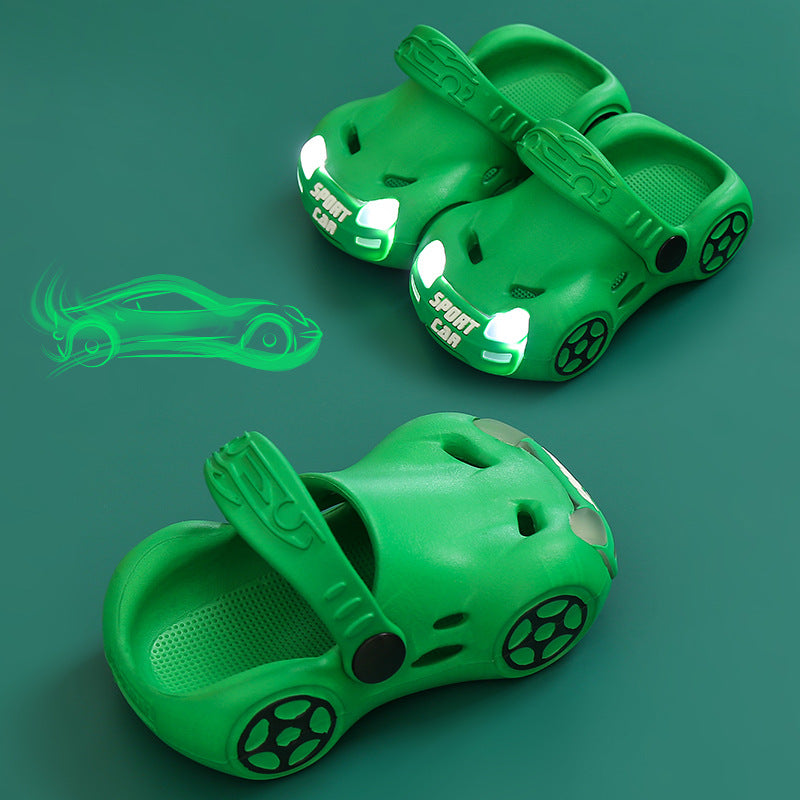 Green car-shaped shoes with glowing effect on a green background