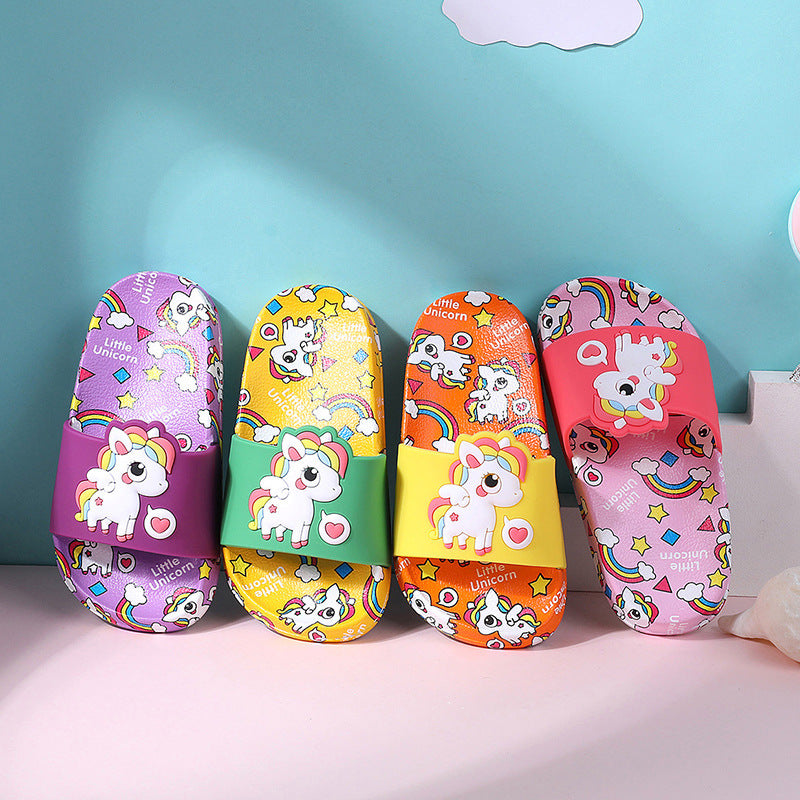 Five colorful children's sandals with unicorn designs on a light blue background.