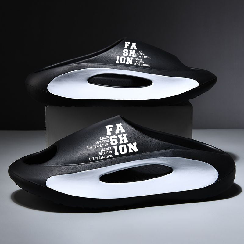 Black and white fashion-themed shoes with 'FASHION' text on a dark background