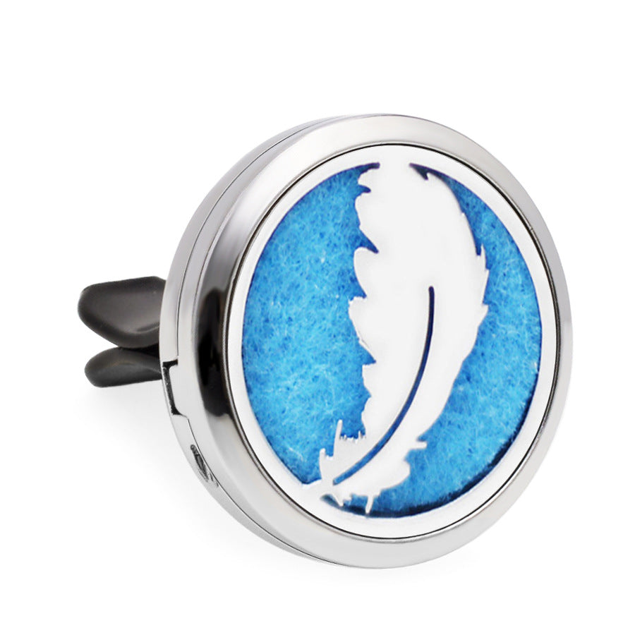 Round metallic diffuser with blue background and white feather design on a white background