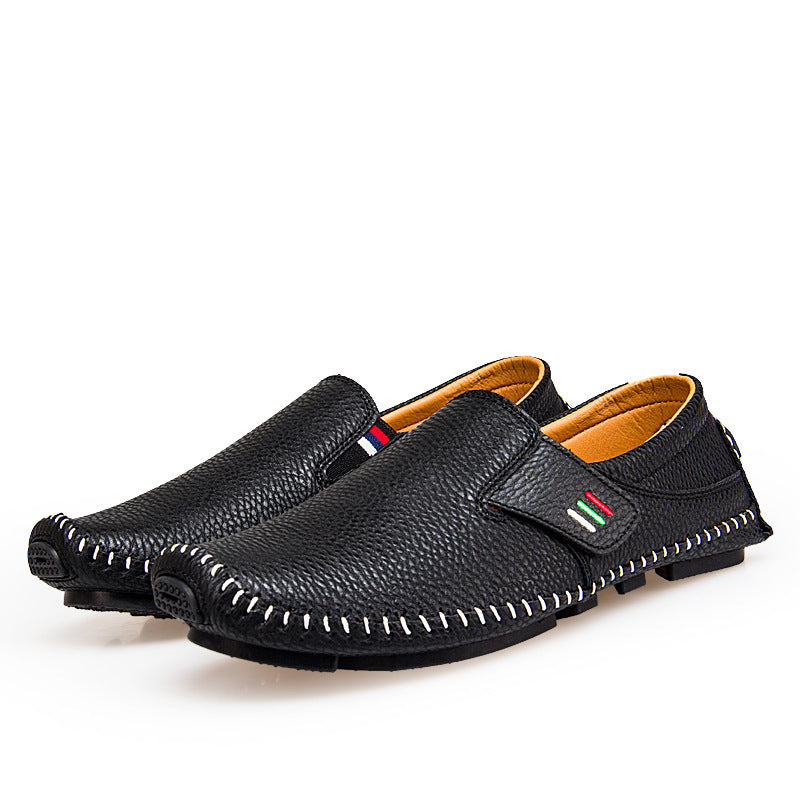 Black leather shoes with a white background