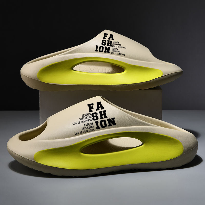 Pair of futuristic shoes with 'FASHION' text on a dark background