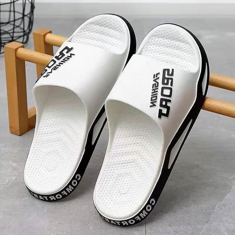 White slides with black accents on a wooden stand against a gray background