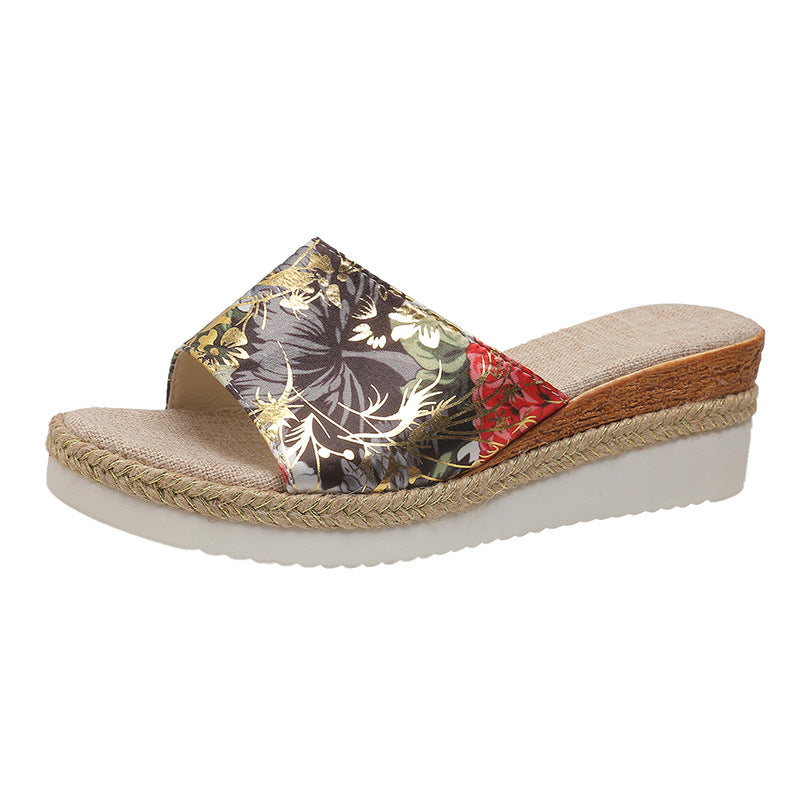 Floral sandal with a woven strap on a white background
