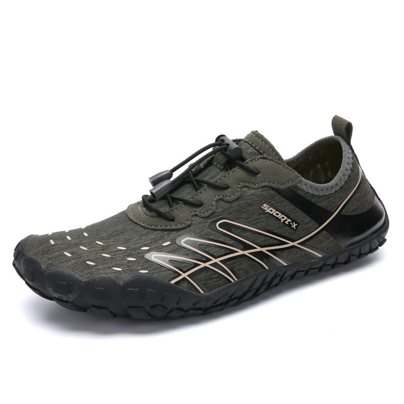 Green athletic shoe with black sole on a white background