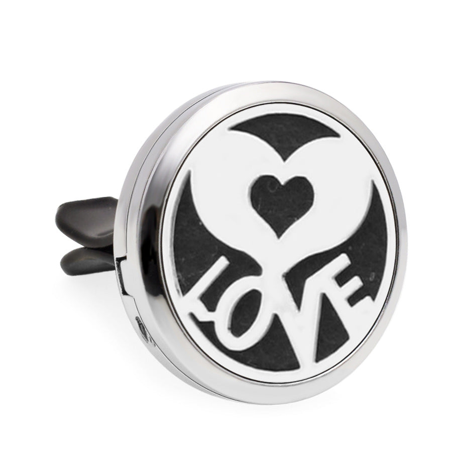 Round metallic diffuser with 'LOVE' and heart design on a white background