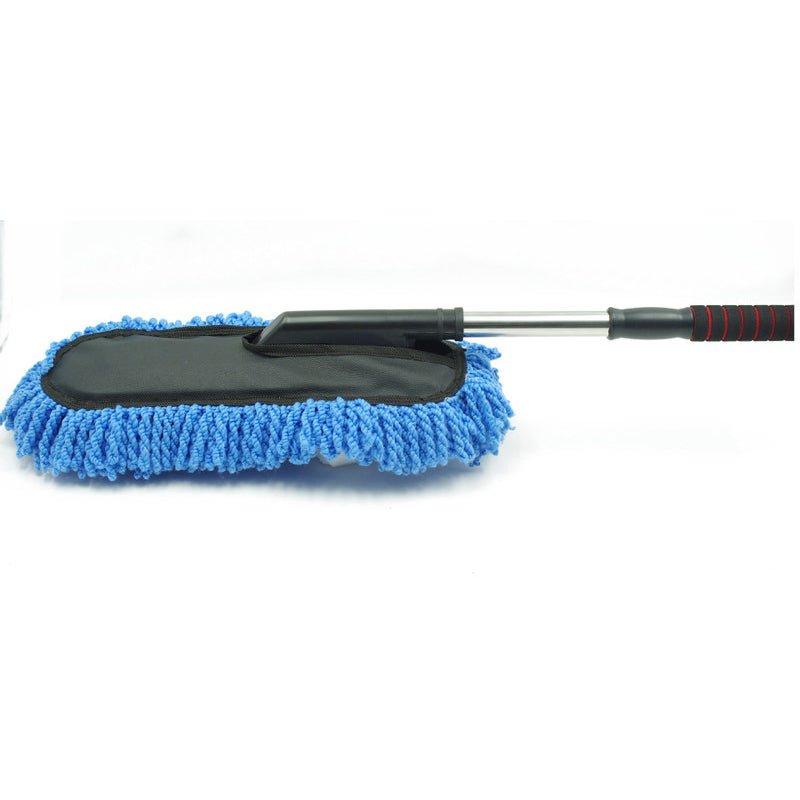 Blue microfiber cleaning brush with extendable handle on a white background