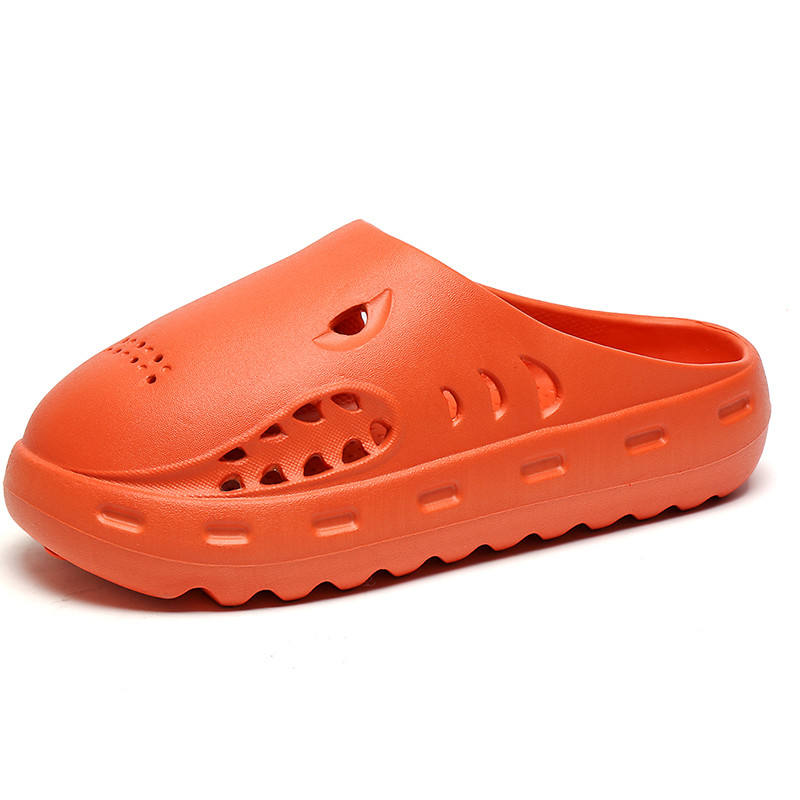 Orange clog shoe on a white background