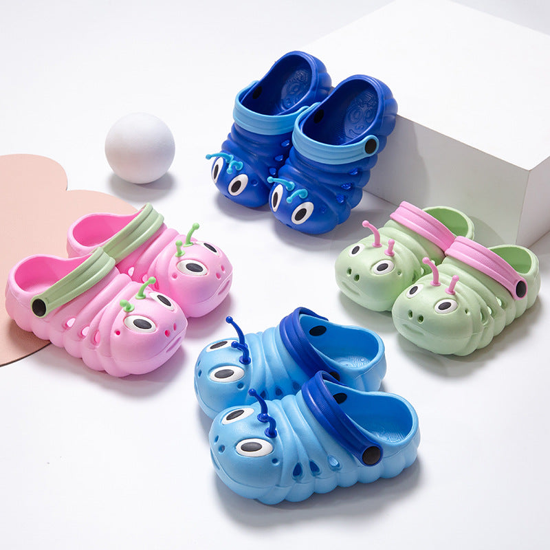 Set of colorful children's shoes shaped like caterpillars on a white background
