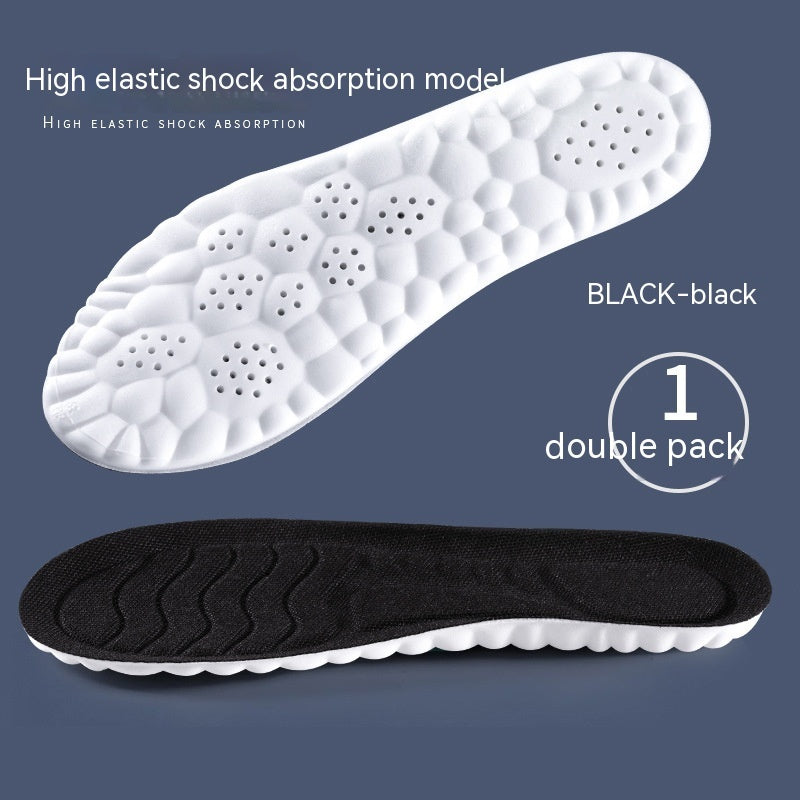 White and black shoe insoles with high elastic shock absorption on a blue background