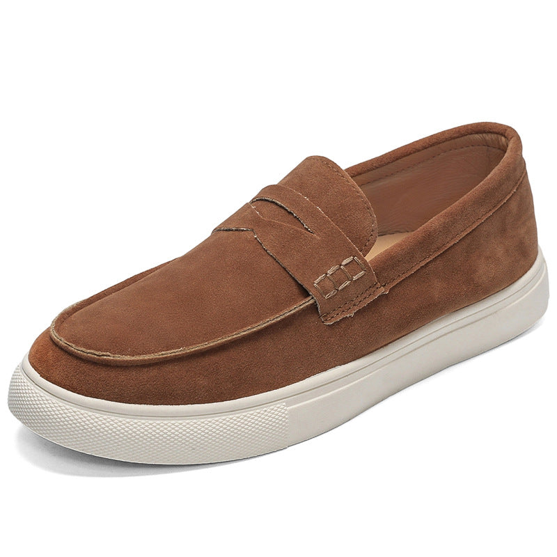 Brown loafer shoe with white sole on a white background