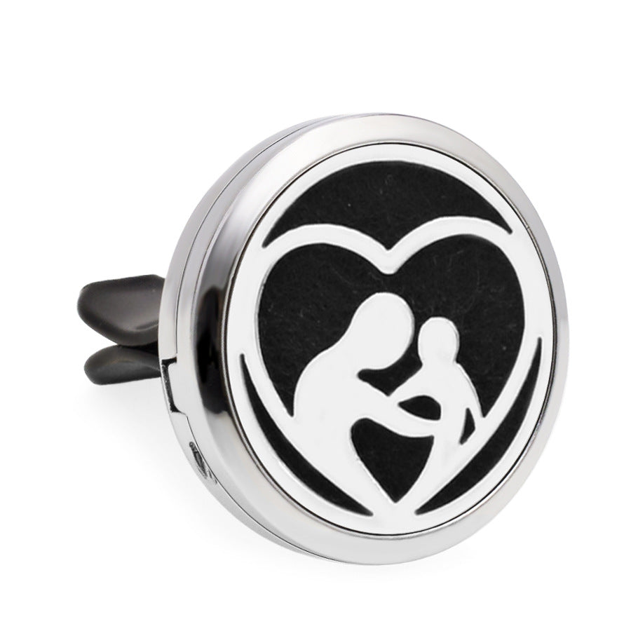 Round metallic diffuser with heart and figure design on a white background