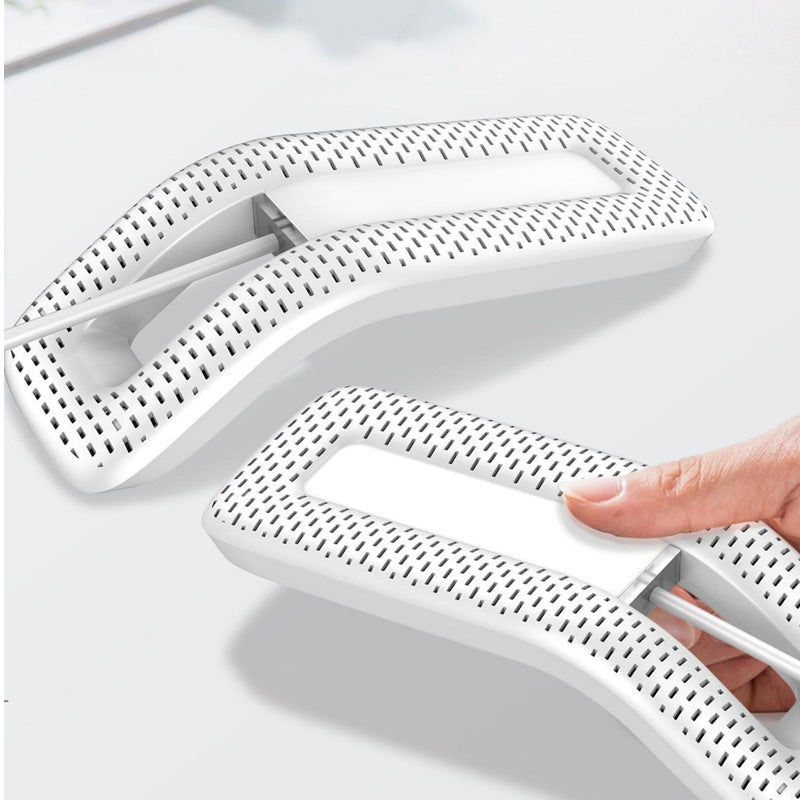 White plastic strainers on a white background