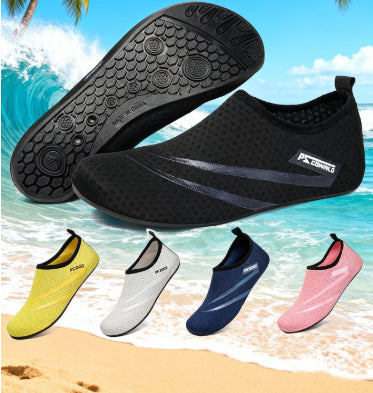 Black water shoes with a brand logo on a beach background