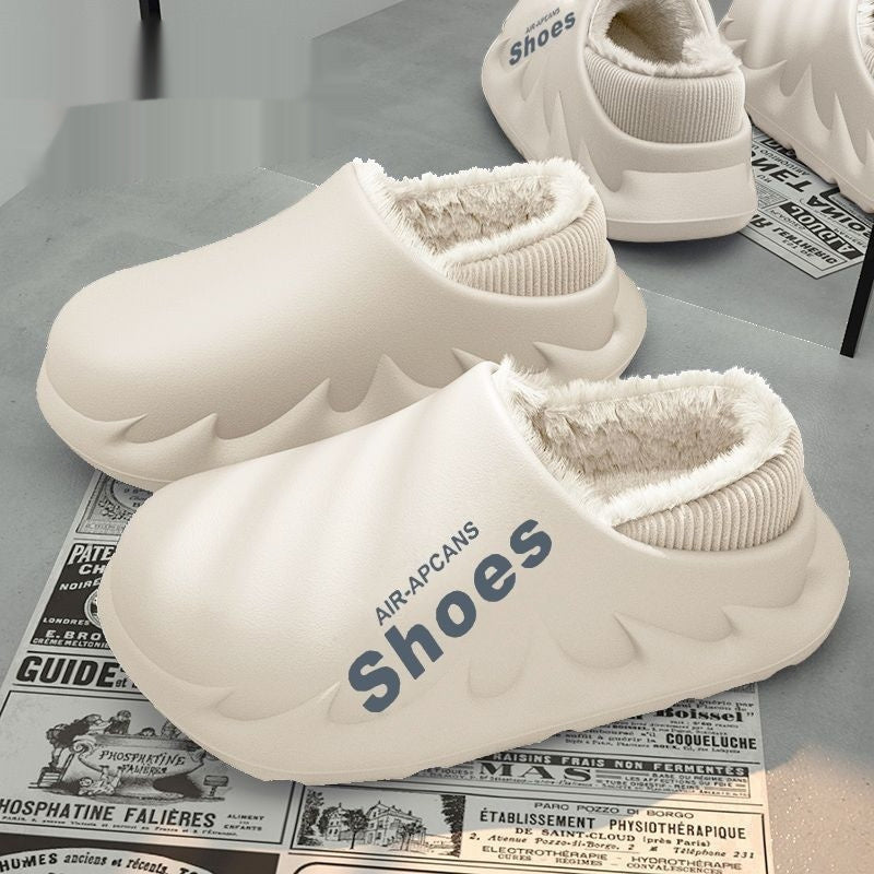 White slippers with fluffy lining on a newspaper background