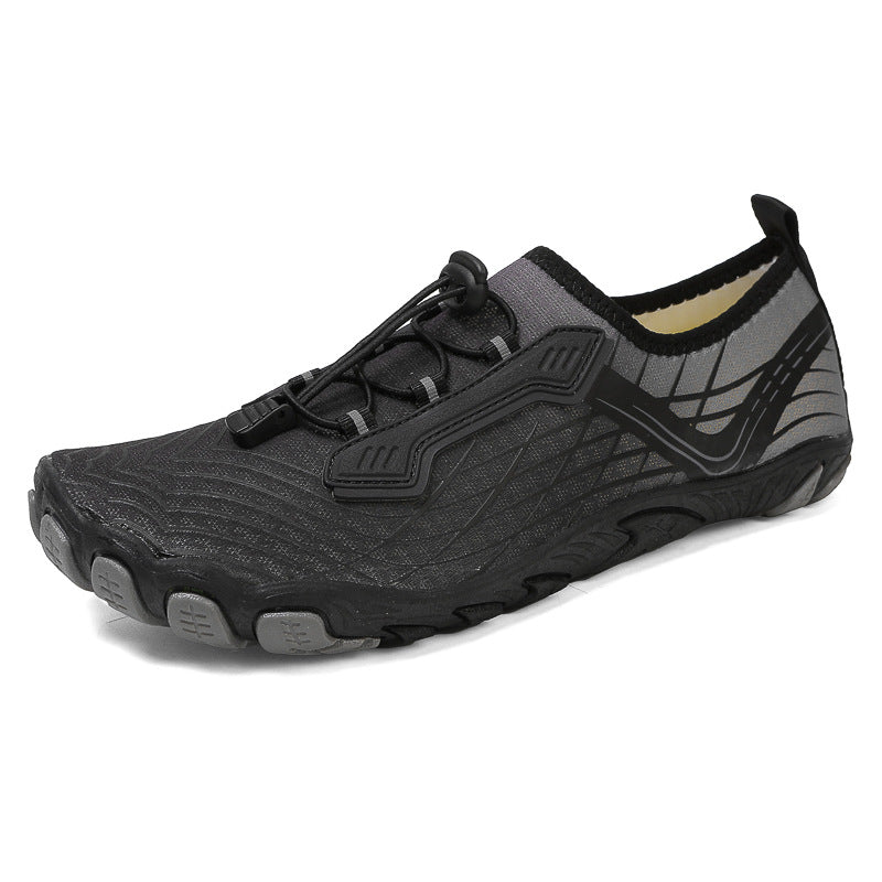 Black slip-on shoe with mesh design on a white background