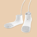 White shoe dryer with a cord on a beige background